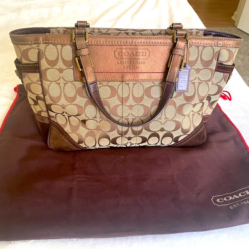 Coach shoulder bag in tan/brown with purple interior